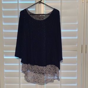 Medium high low light weight sweater shirt.